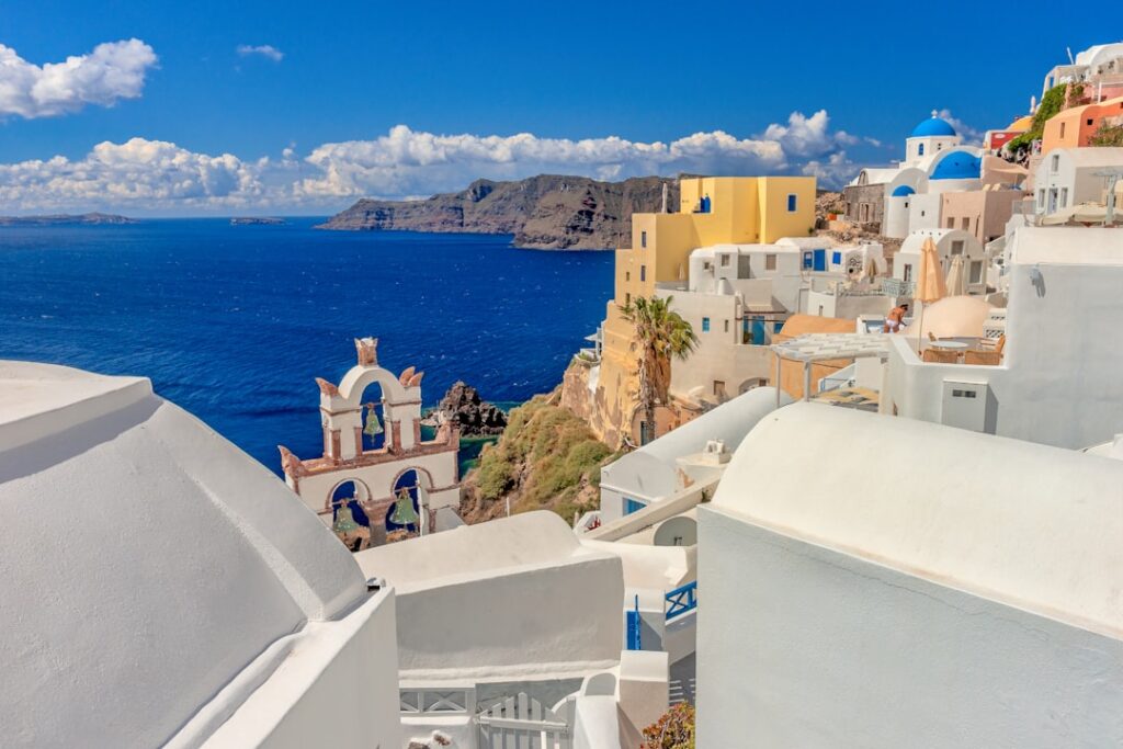 White buildings and blue domes of a greek island village